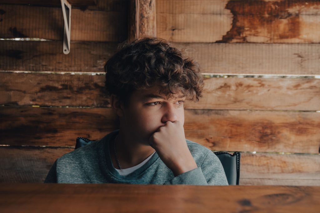 Boy looking anxious before going back to school